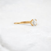 dawnfire-sparkle-round-cut-cluster-moissanite-engagement-ring-0-70-ct-yellow-gold-gemfora-2